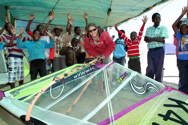 Zara Davis with children in Nambia ©  Weymouth Speed Week